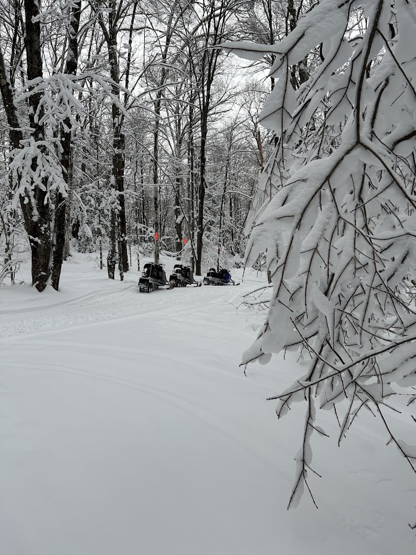Snowy wooded trail in Stowe, Vermont in winter