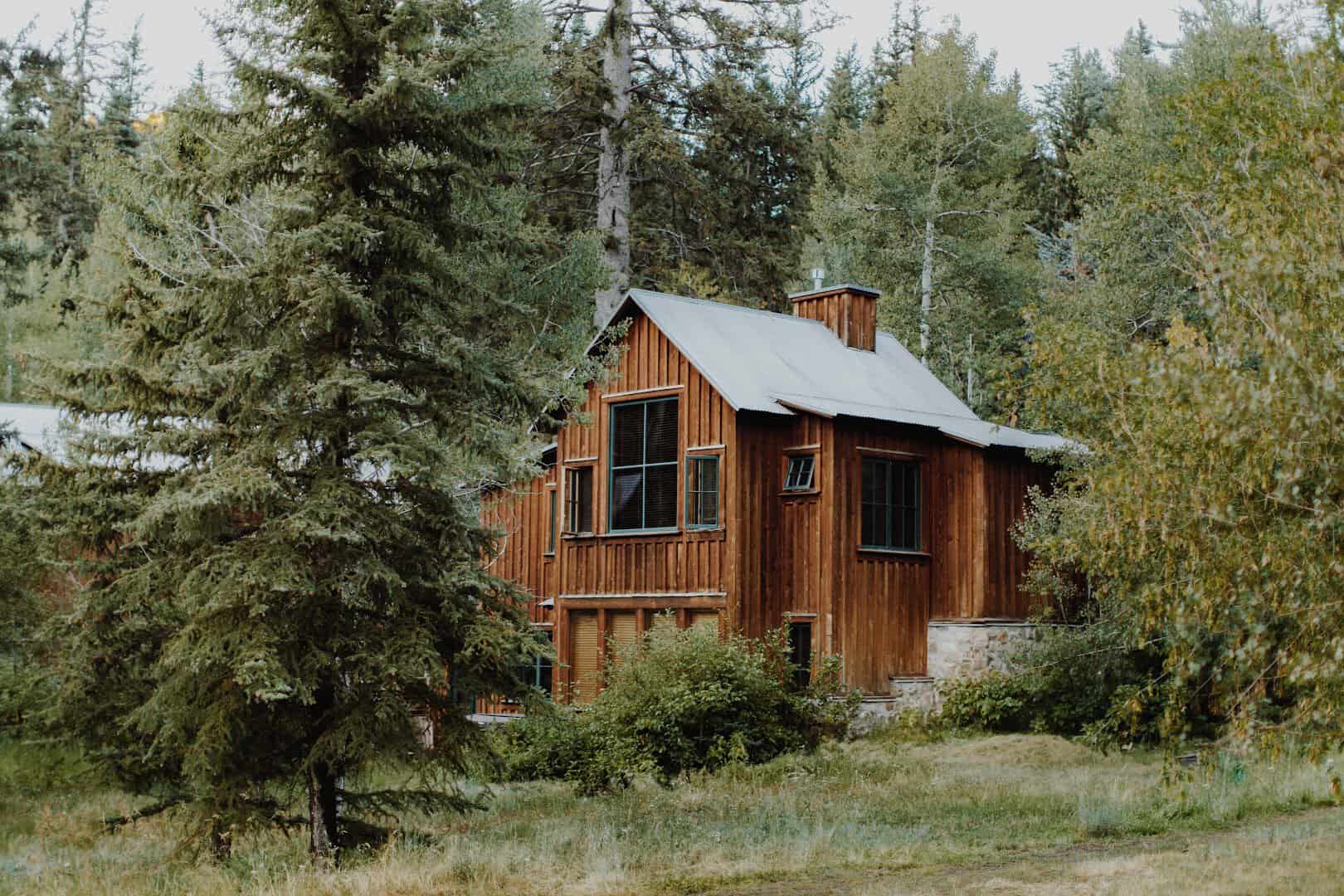 Rustic wood cabin tucked among the pines at Sundance Mountain Resort in Utah