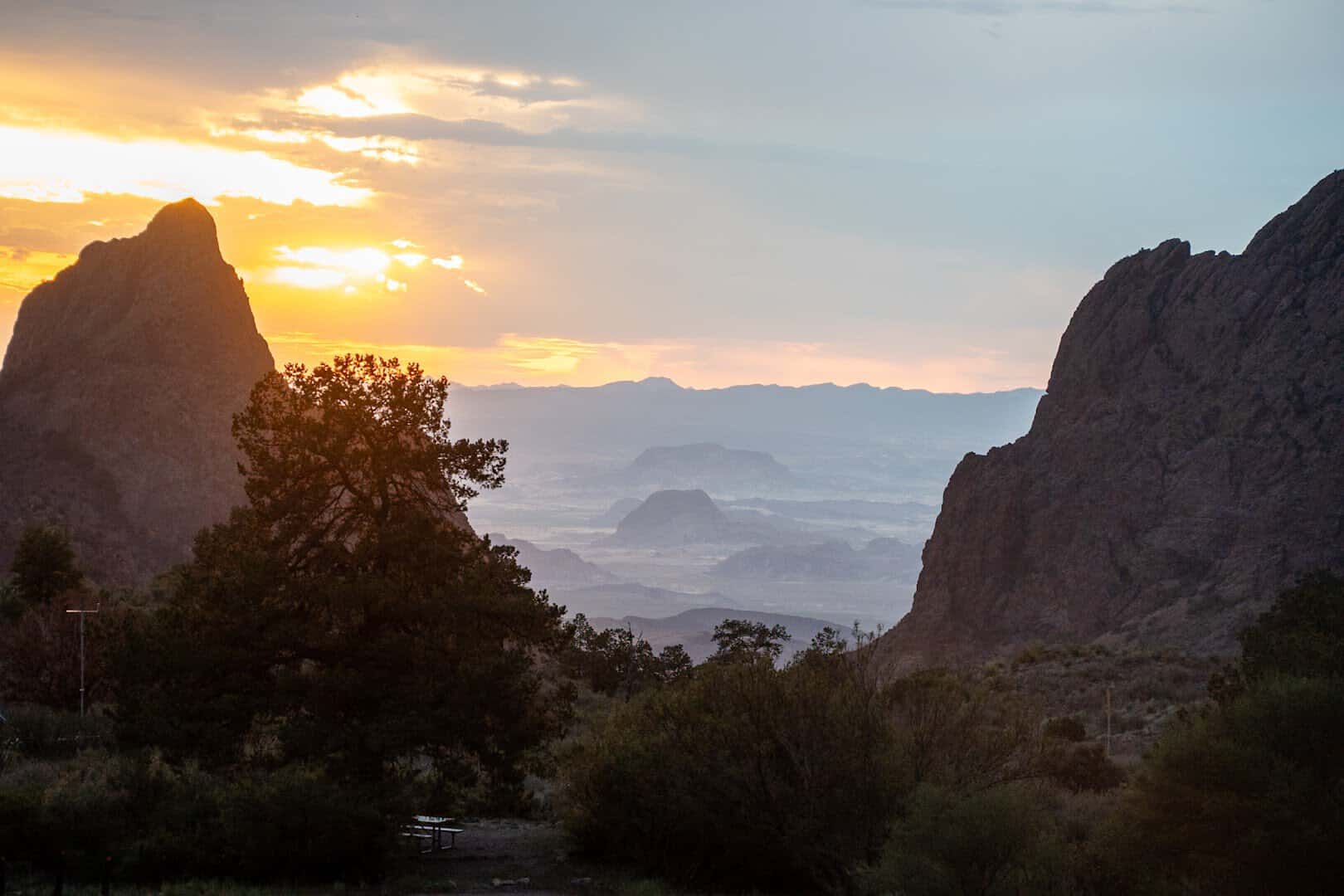 The sun dropping through the Window gap in the Chisos Basin rim