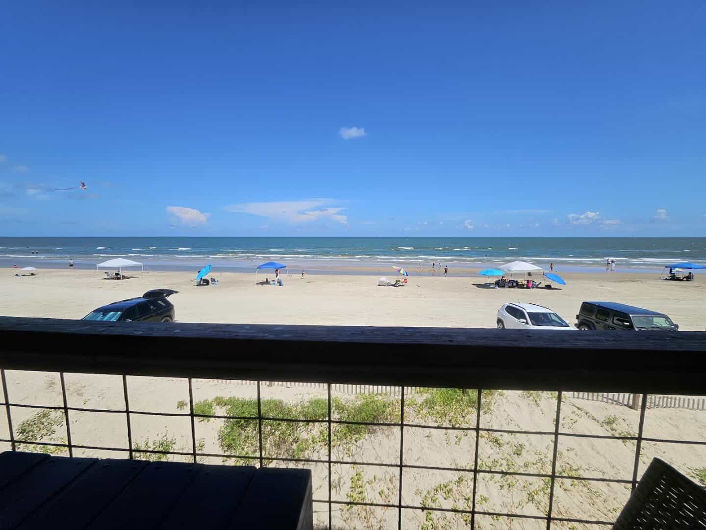 Surfside Beach shoreline and Gulf seen from the deck at Seahorse Bar & Grill