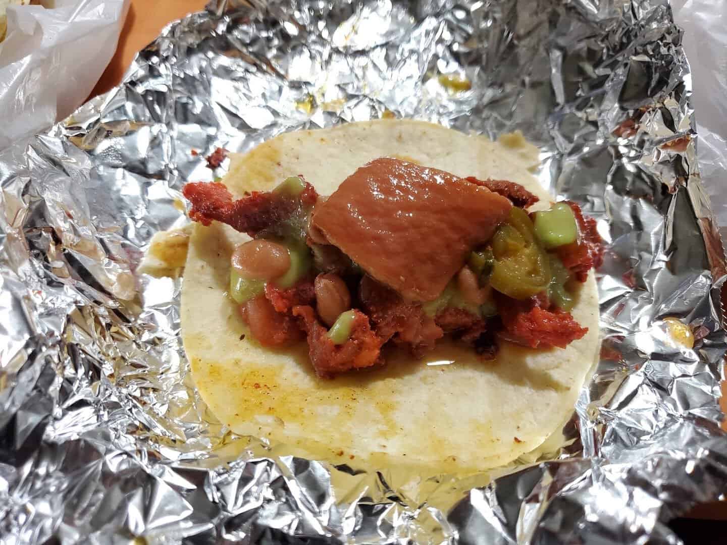 Taco with charro beans and jalapeno at El Taconazo in Houston