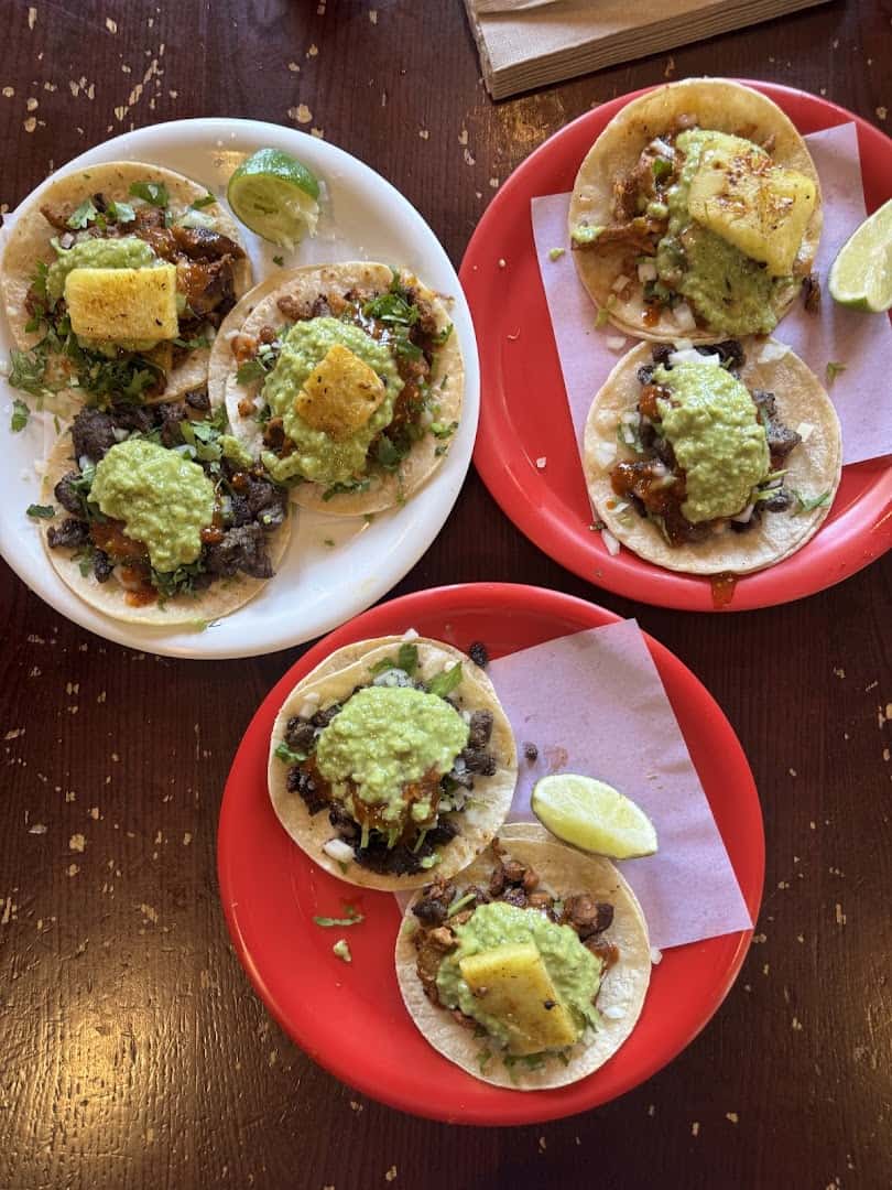 Adobada tacos with grilled pineapple at Tacos Chukis in Seattle