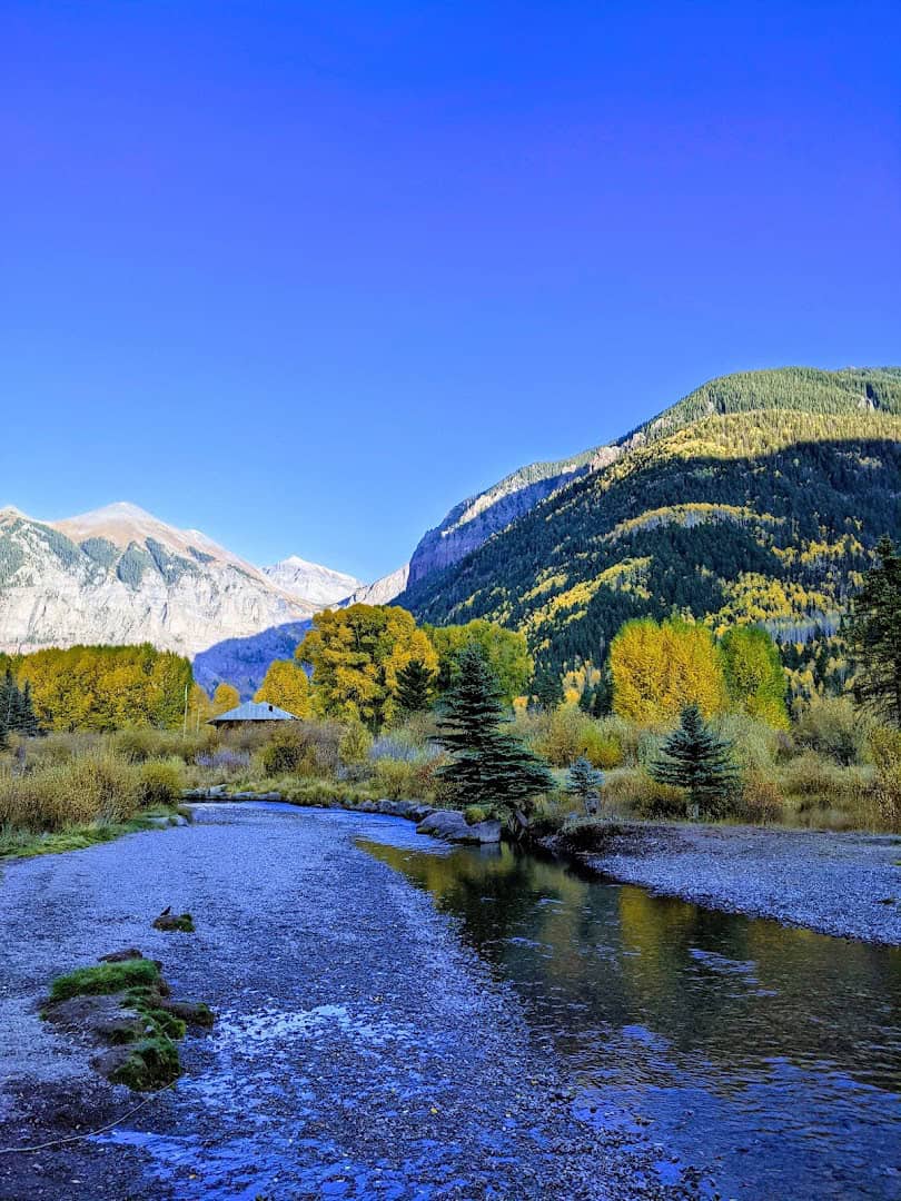 Box canyon and snow-capped peaks above Telluride, Colorado