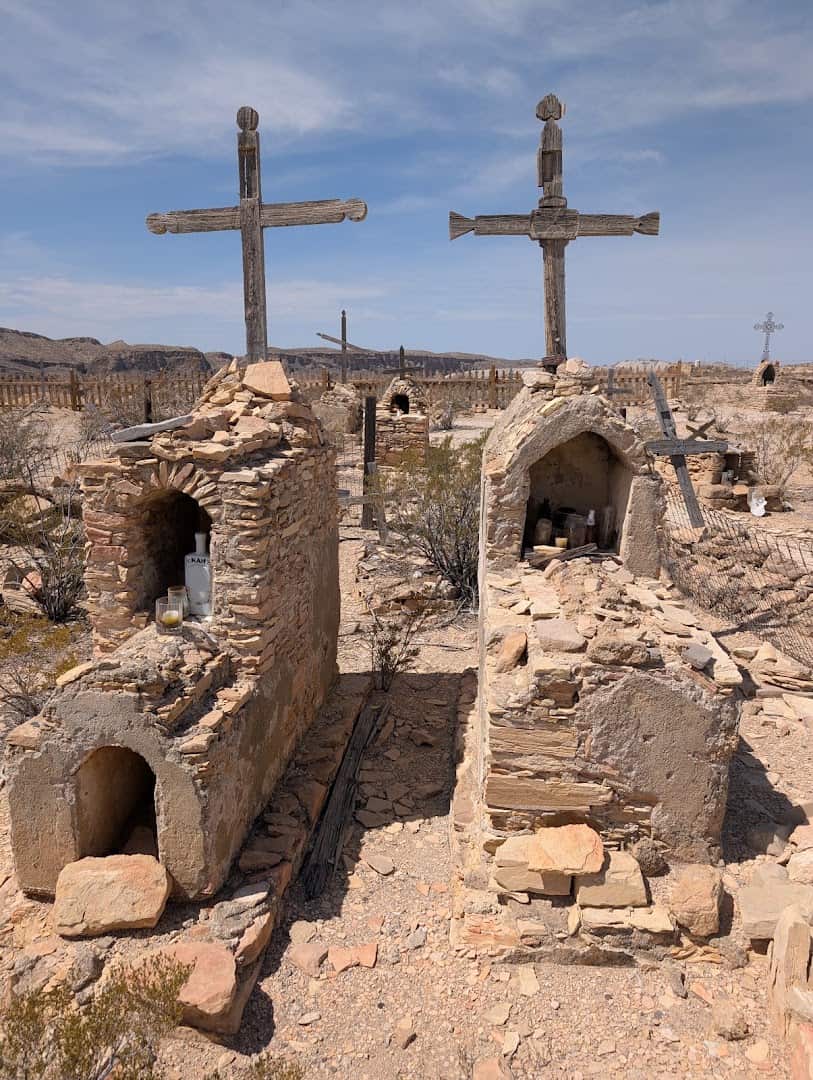 Crosses and adobe graves at the historic Terlingua ghost town cemetery, Texas