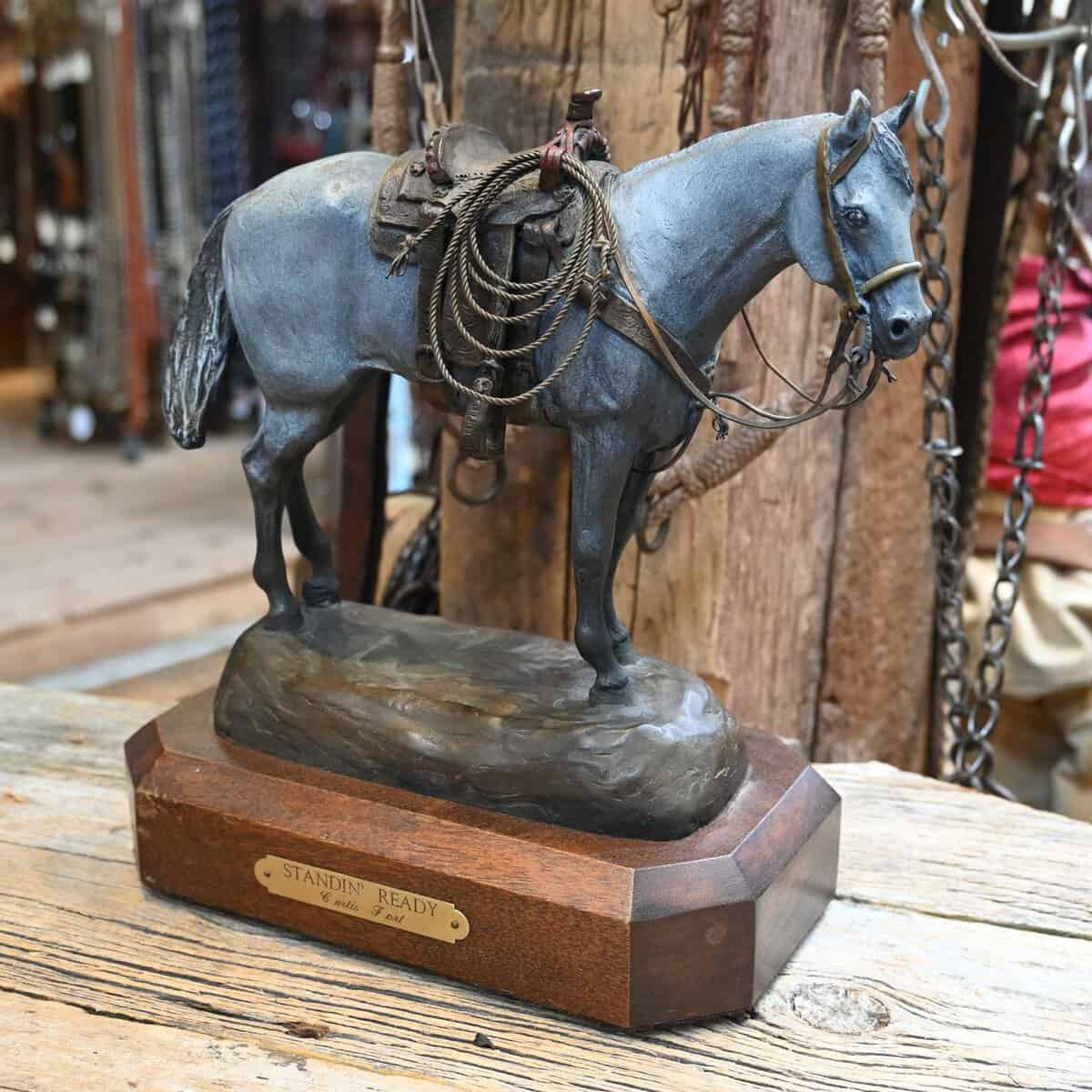 Bronze Western sculpture on display at Teskey's Saddle Shop in Weatherford, Texas