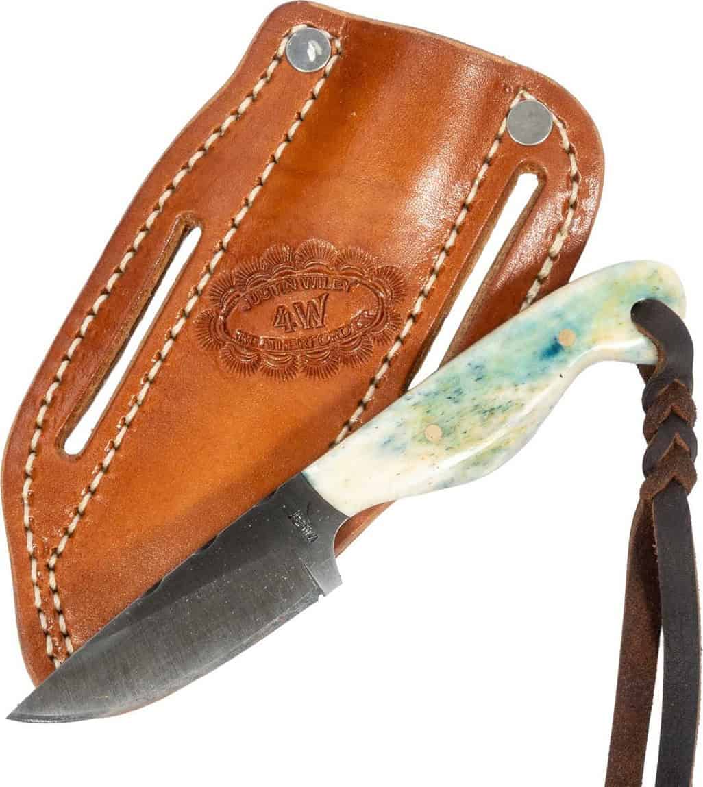 Western knife in a tooled leather sheath at Teskey's Saddle Shop in Weatherford, Texas