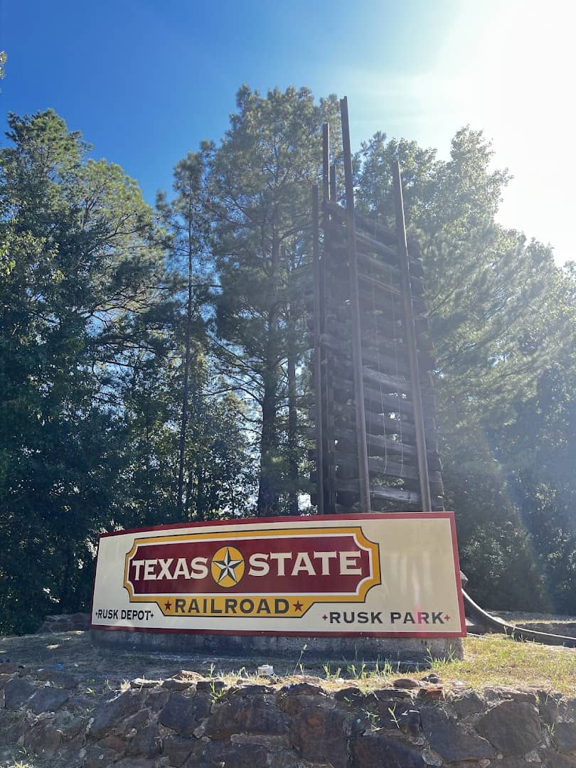 Texas State Railroad Rusk Park entrance sign among the East Texas pines