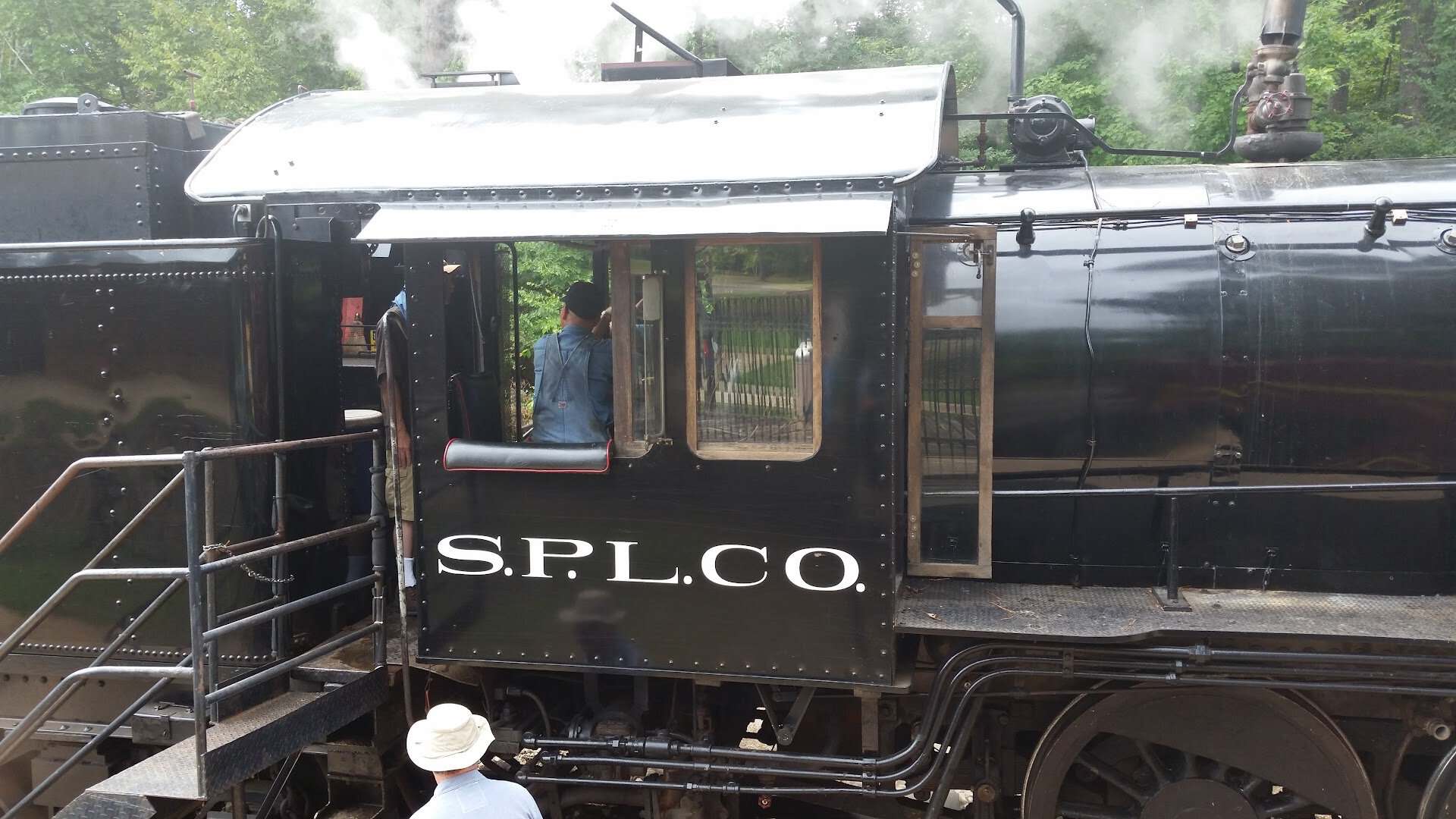 Vintage steam locomotive lettered S.P.L.Co. at the Texas State Railroad