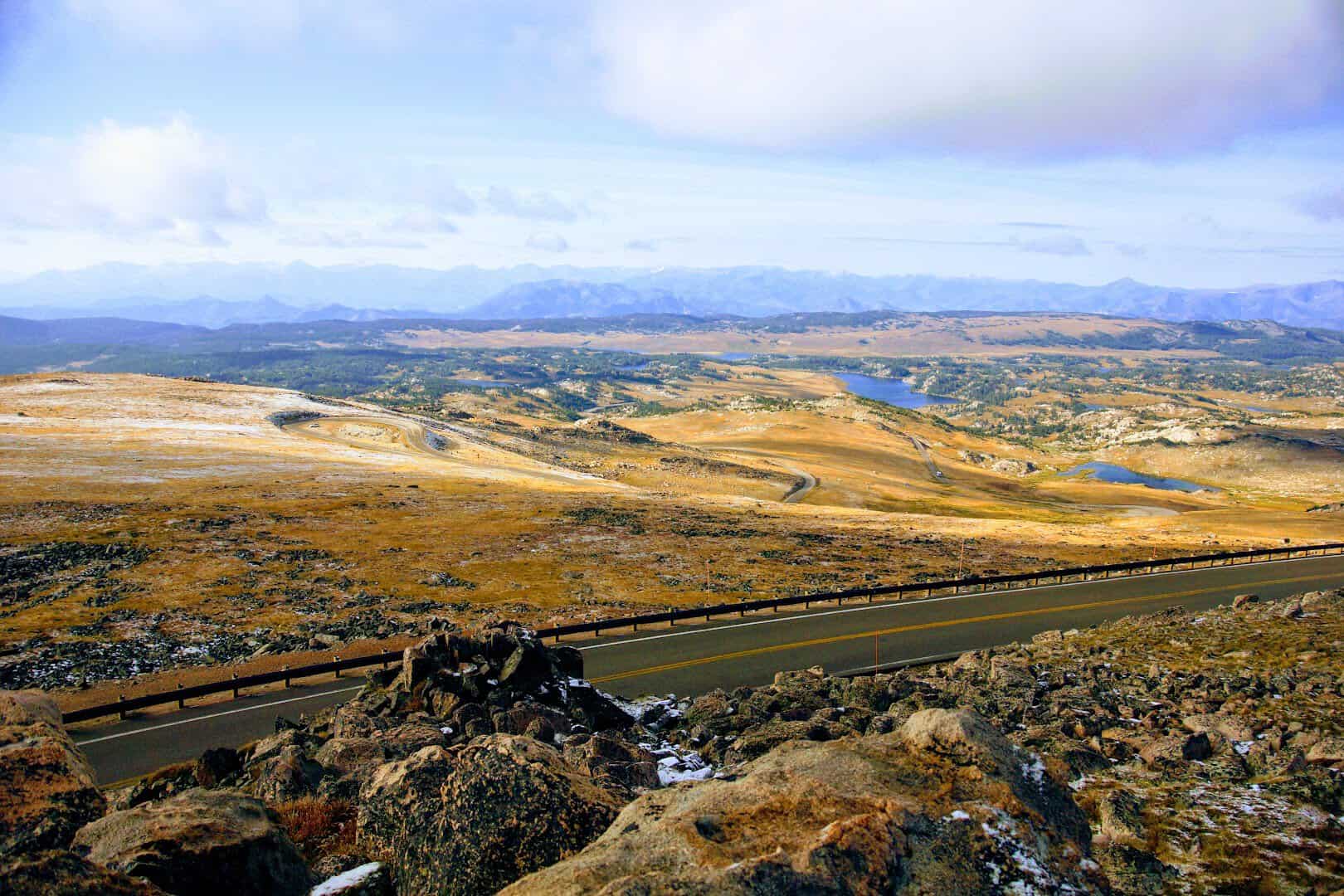 The Beartooth Highway winding past alpine lakes and mountains in Wyoming