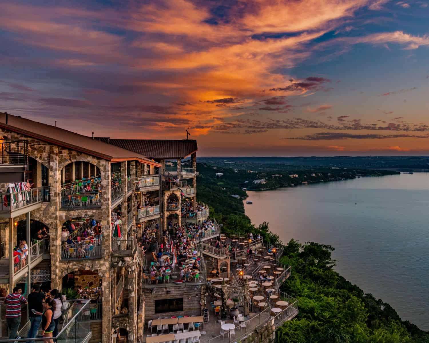 Sunset over Lake Travis from the tiered decks of The Oasis near Austin, Texas