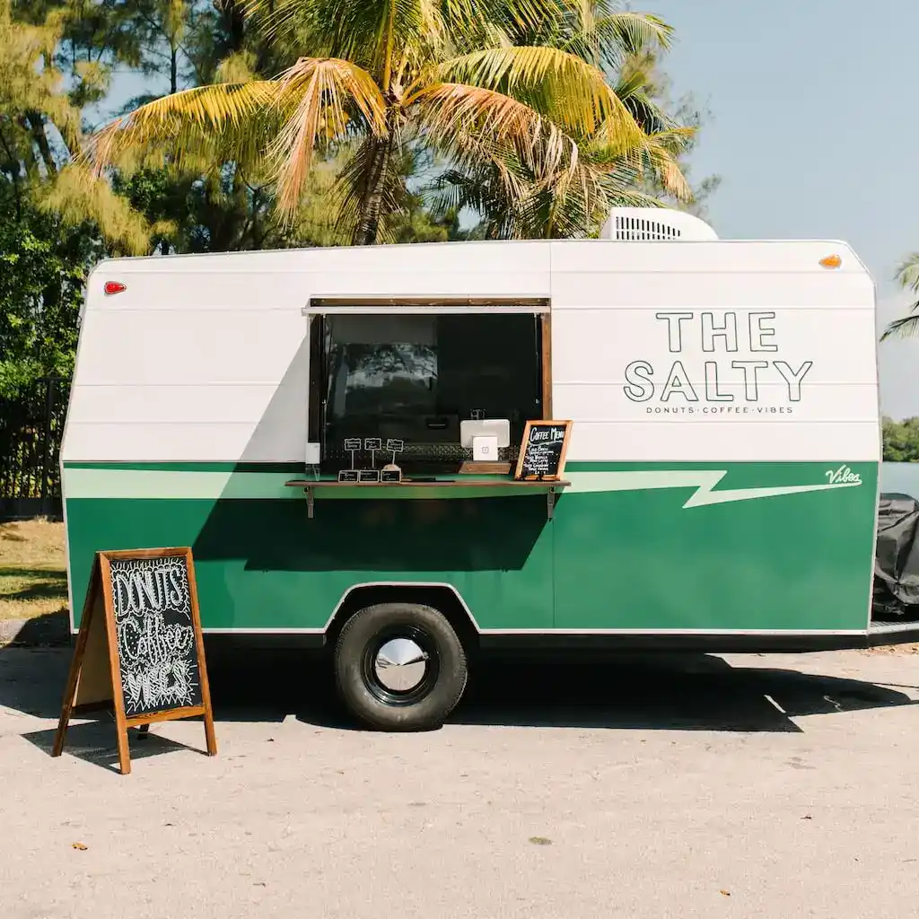 The Salty Donut branded vintage camper in Miami, Florida