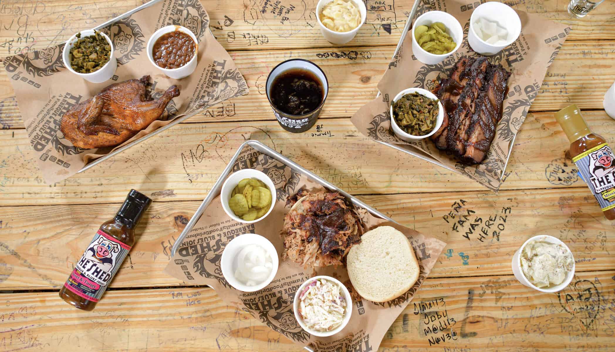 Baby back ribs and sides at The Shed Barbeque in Ocean Springs, Mississippi