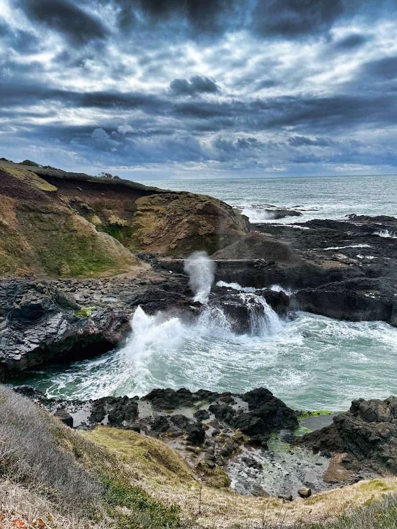 Water bursting from Thors Well on the rocky Oregon coast at Cape Perpetua