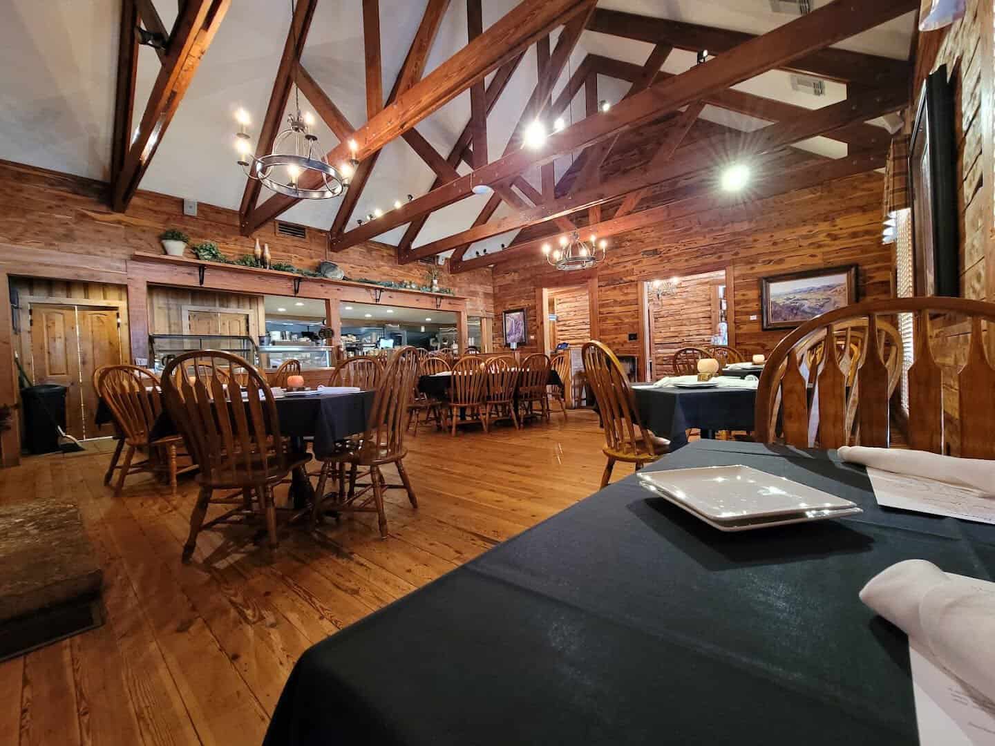 Timber-frame dining room with handmade furniture at Cafe Homestead in Waco, Texas