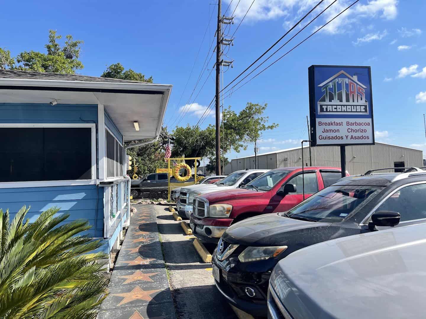 The bright blue building that houses Titas Taco House in Humble, Texas