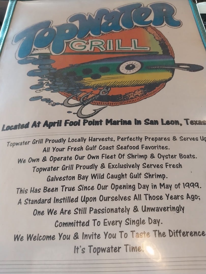 Topwater Grill sign telling the restaurant's story since its 1999 opening