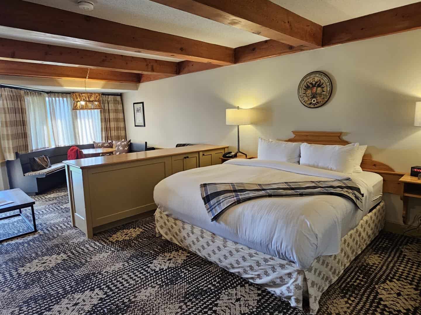 Cozy beamed guest room at Trapp Family Lodge in Stowe, Vermont