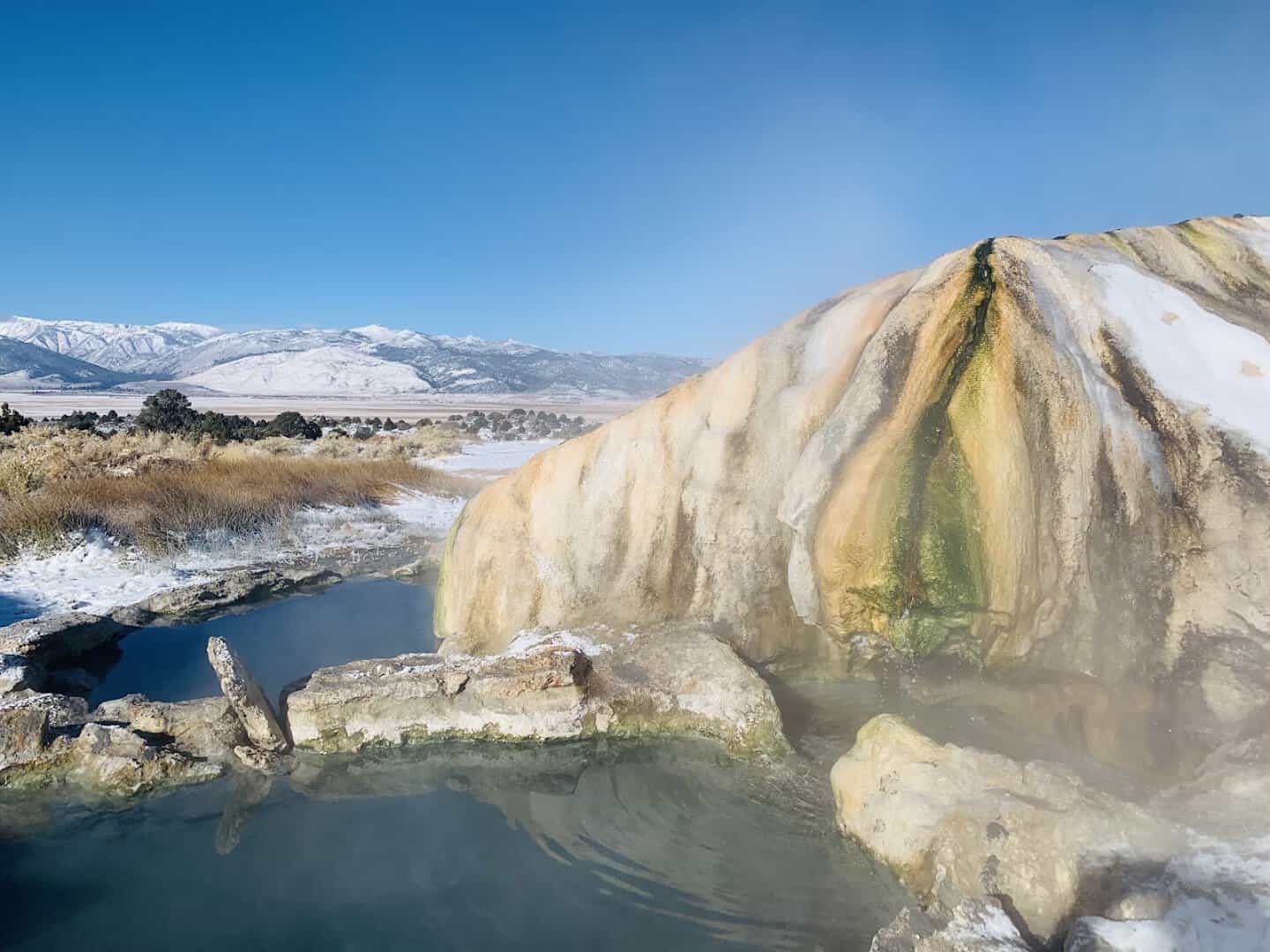 Travertine Hot Springs mineral mound and soaking pool with steam near Bridgeport, California