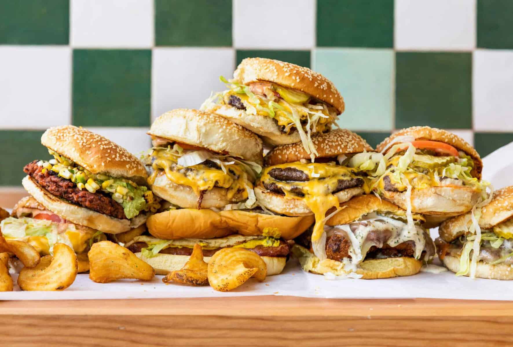Stack of smash burgers from Underbelly Burger at the Houston Farmers Market in Houston