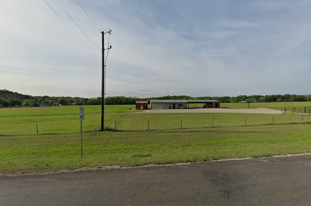 Country road and farmland around Veal Station in Parker County, Texas