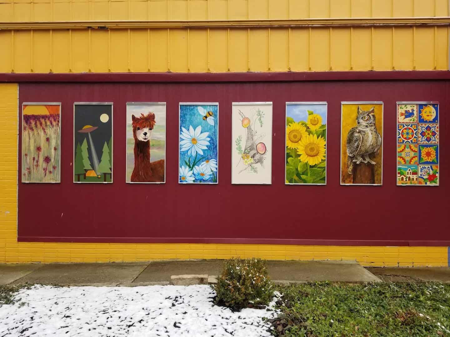 Colorful painted art panels at Village Artisans gallery, Yellow Springs, Ohio