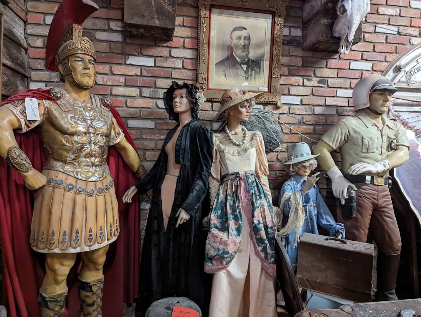 Life-size mannequins in vintage clothing at The Whoopee Bowl Antique Mall in Canutillo, Texas