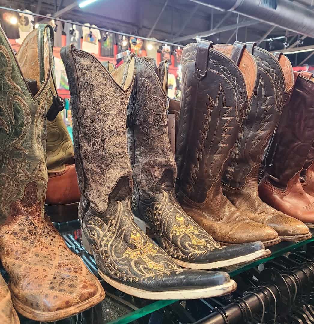Row of vintage cowboy boots at Leopard Lounge in Houston