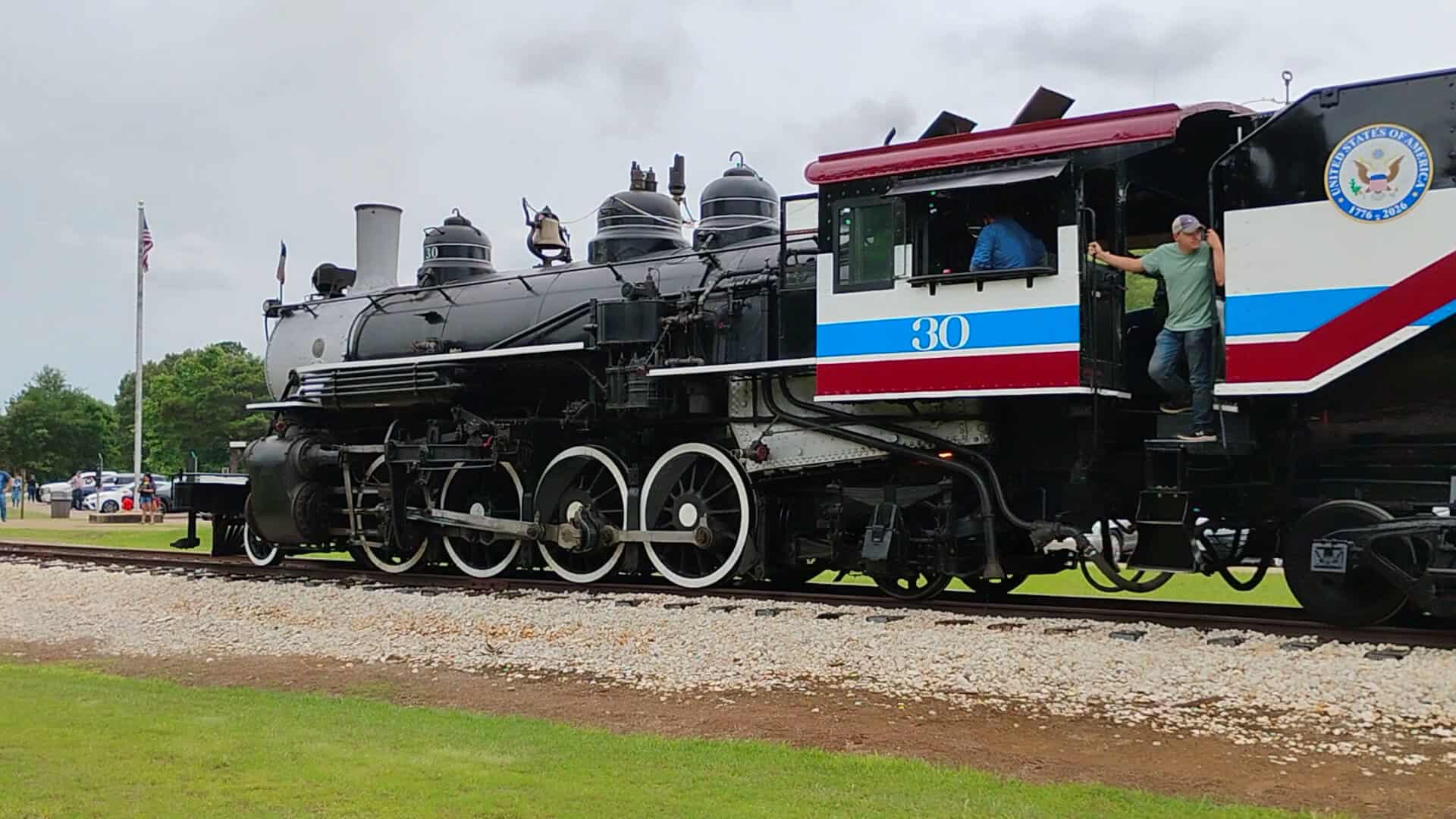Vintage black steam locomotive on display at the Texas State Railroad depot