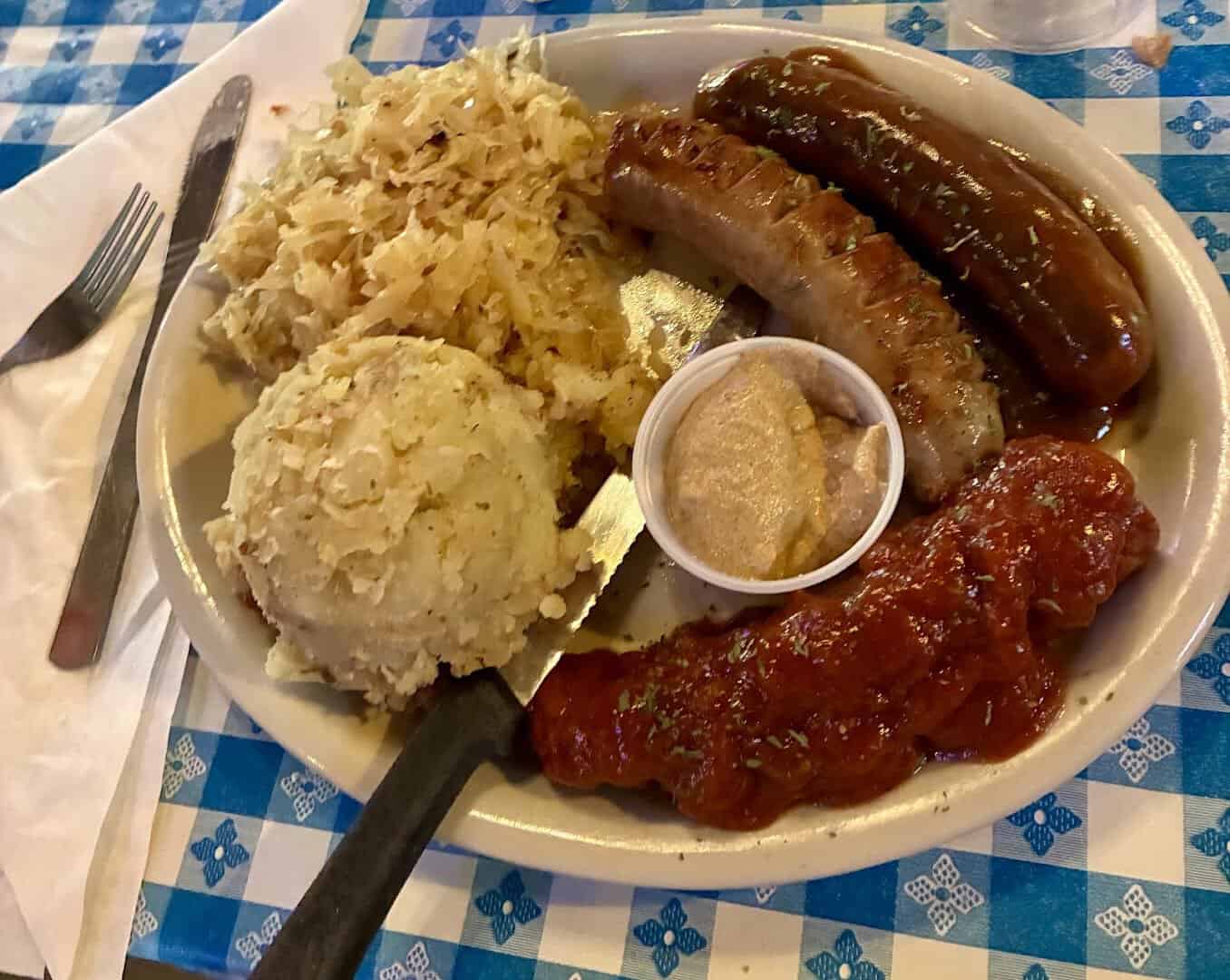 Sausage platter with dumplings and gravy at Walburg German Restaurant