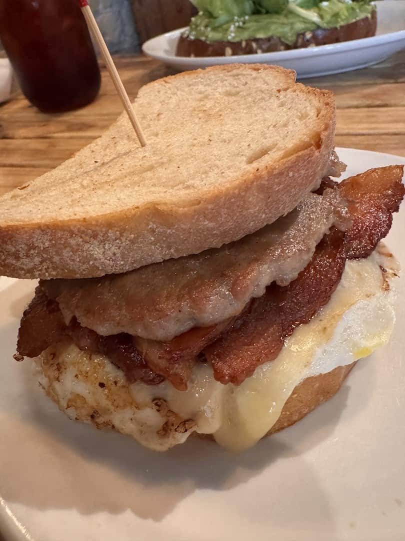 Stacked bacon, egg and cheese sandwich at Walton's Fancy and Staple in Austin