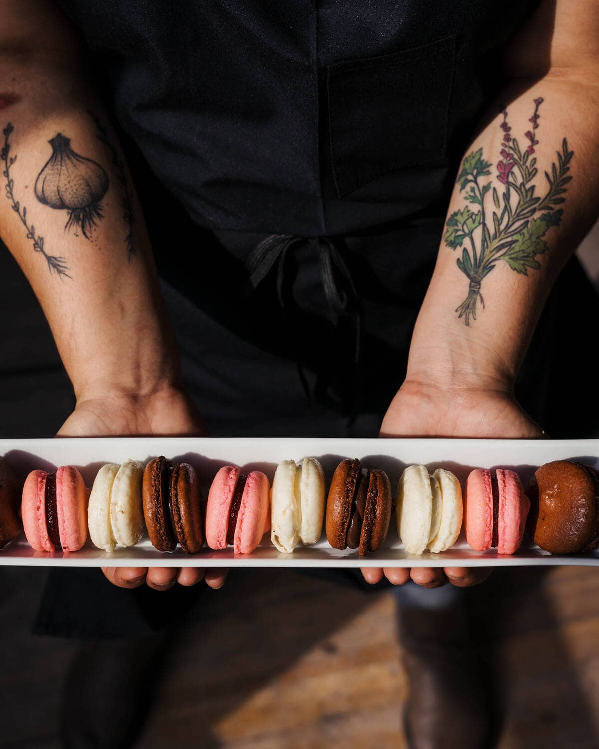 A tray of colorful macarons at Walton's Fancy and Staple in Austin