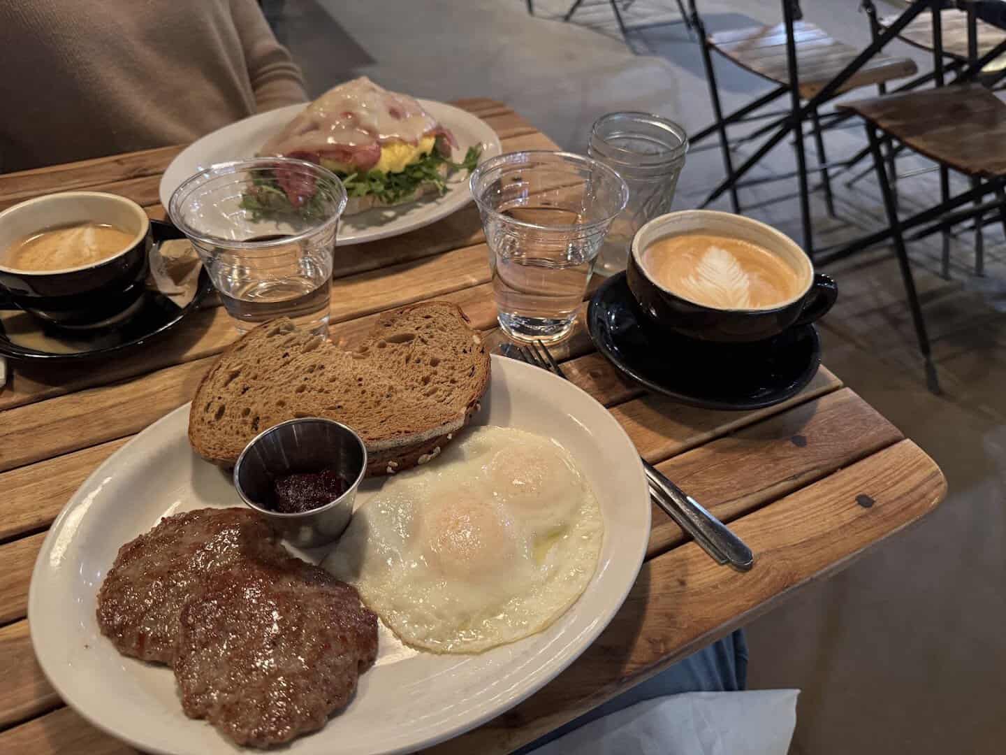 Sandwich plate with coffee at Walton's Fancy and Staple in Austin