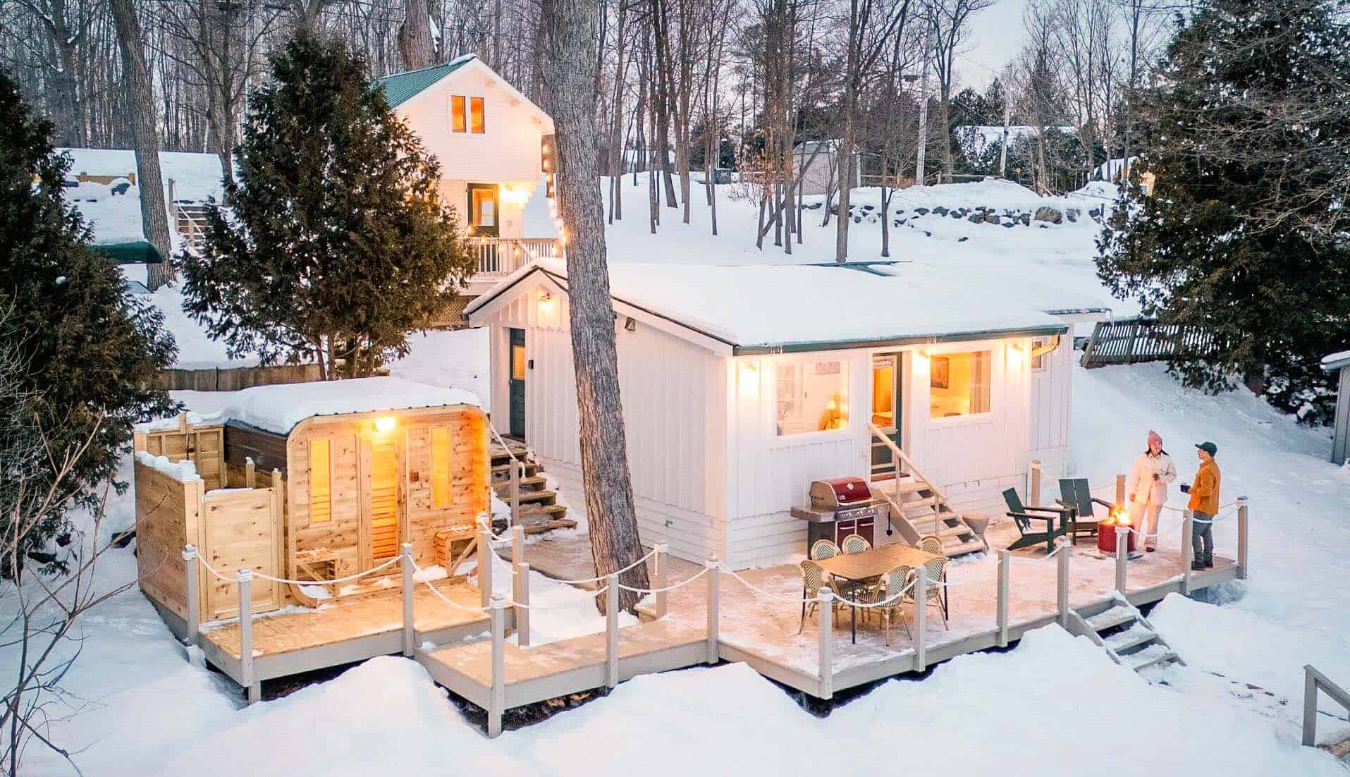 A-frame log cabin in the snowy Adirondack woods at Warners Camp in New York