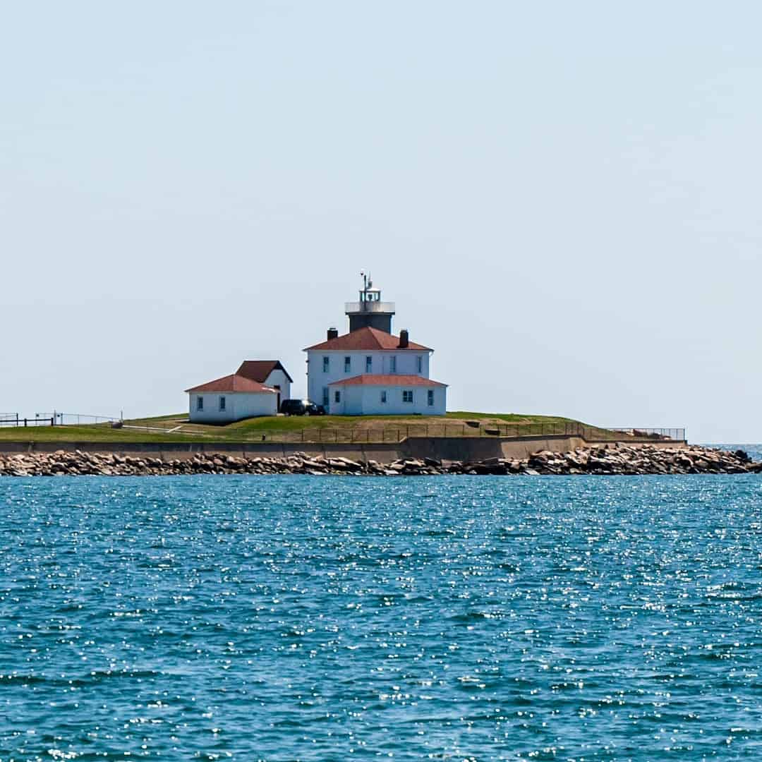 Watch Hill Lighthouse on the shore in Watch Hill, Rhode Island