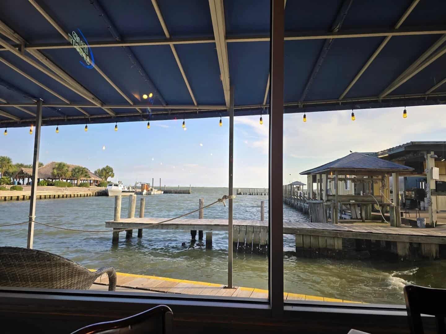 Covered waterfront patio overlooking Galveston Bay at Topwater Grill