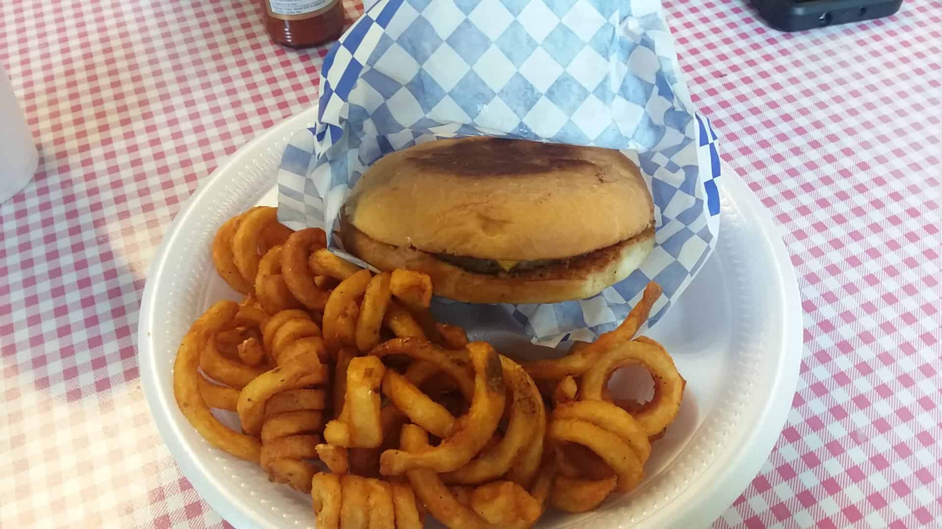 Burger and curly fries at Kountry Bakery in Weimar, Texas