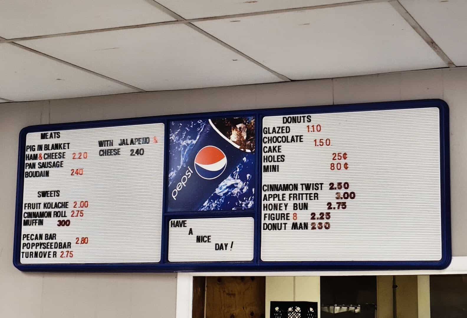 Menu board of kolaches, donuts and pastries at Kountry Bakery in Weimar, Texas