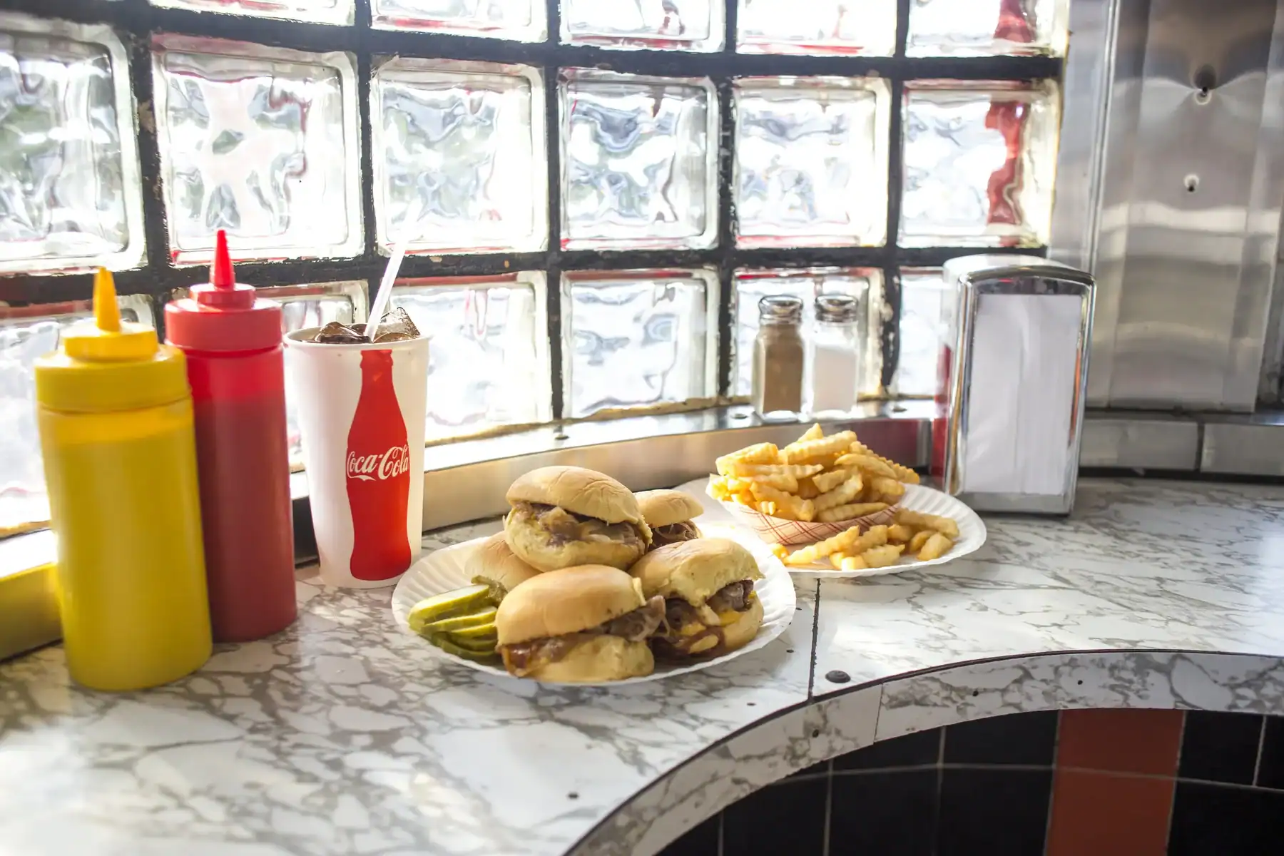 Sliders and fries on the counter at White Manna in Hackensack, New Jersey