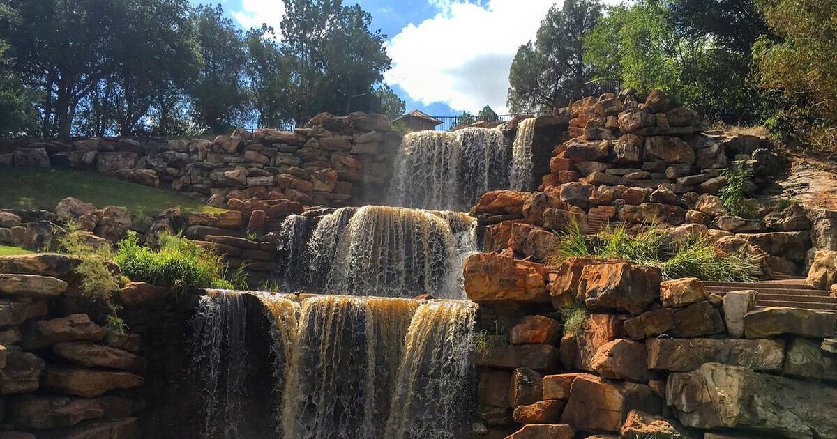 This Quiet North Texas Park Ends a Swaying Bridge at a 54-Foot Waterfall