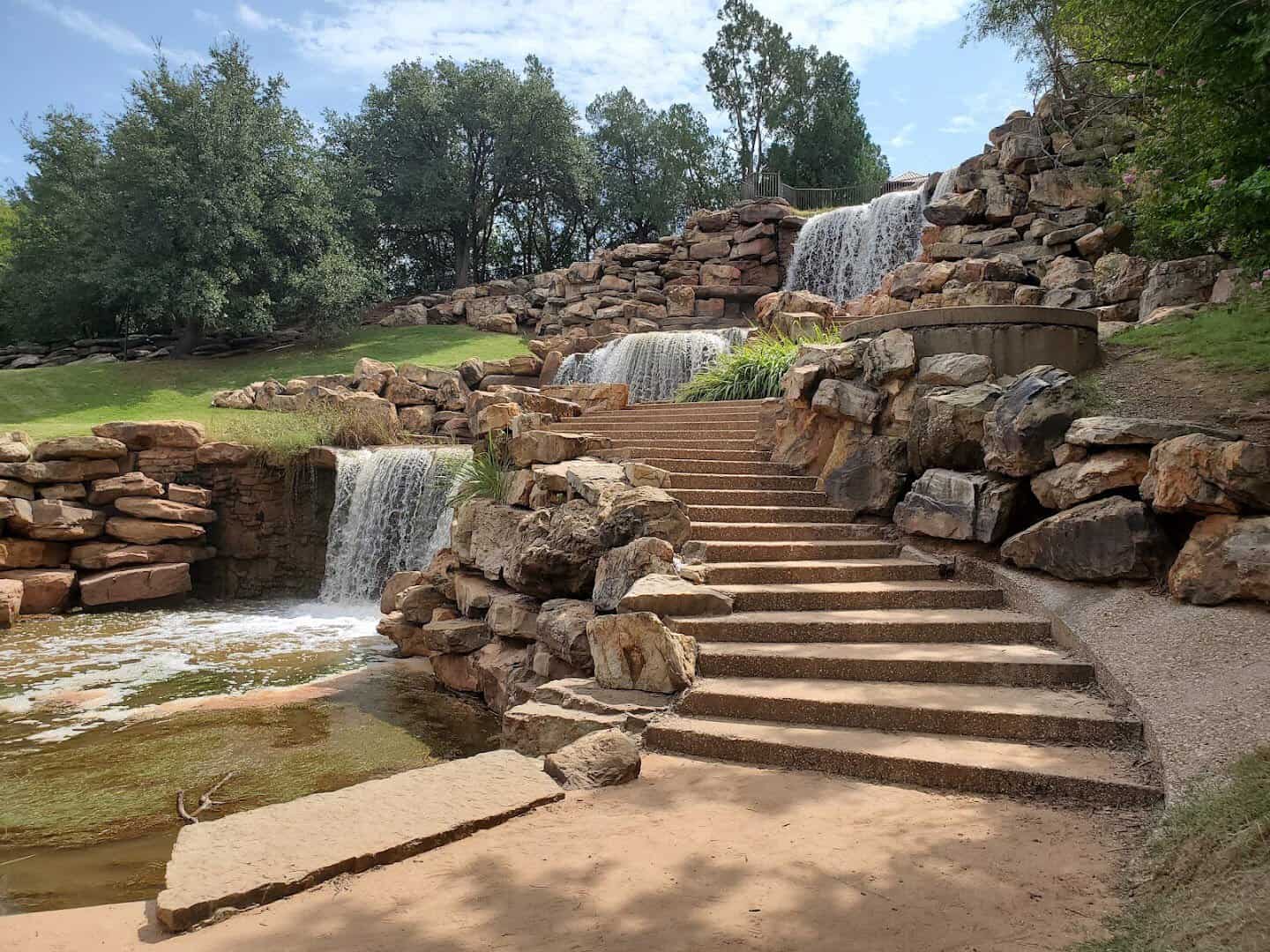 The 54-foot Wichita Falls waterfall and stone steps at Lucy Park