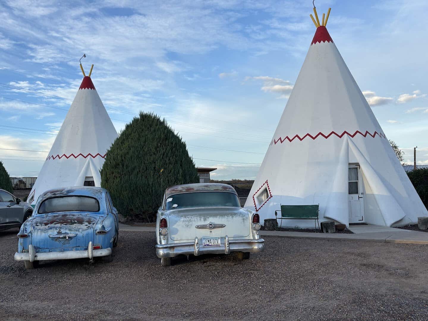 Concrete teepees and vintage cars at the Wigwam Motel in Holbrook, Arizona