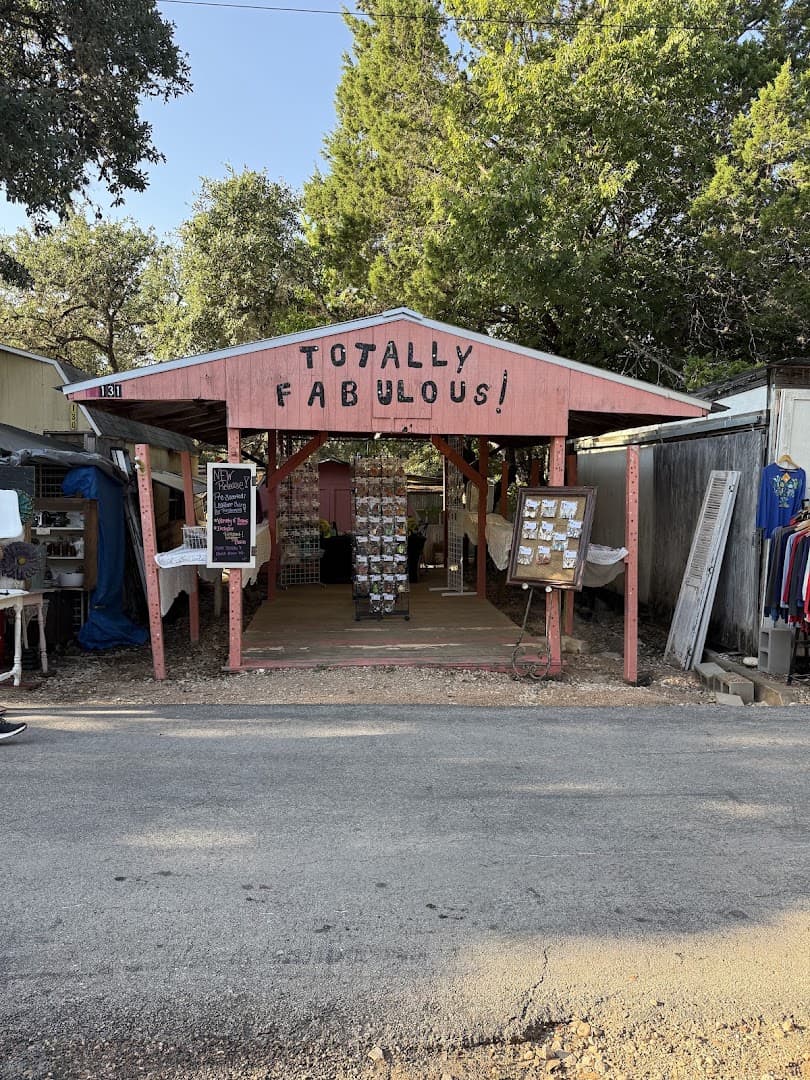 Wimberley Market Days booth under oaks in Wimberley