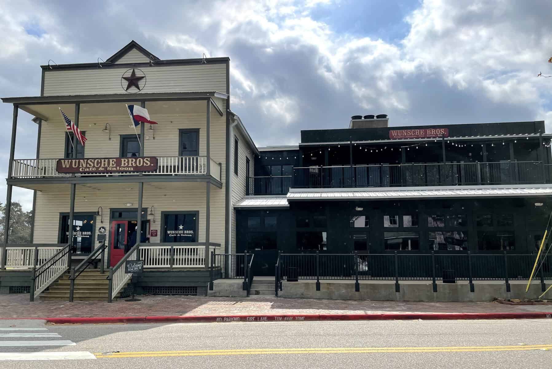 The historic Wunsche Bros. Cafe and Saloon building with a Texas star in Old Town Spring, Texas