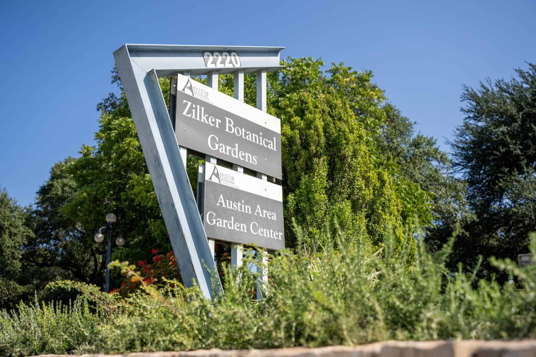 The entrance sign for Zilker Botanical Garden and Austin Area Garden Center in Austin, Texas