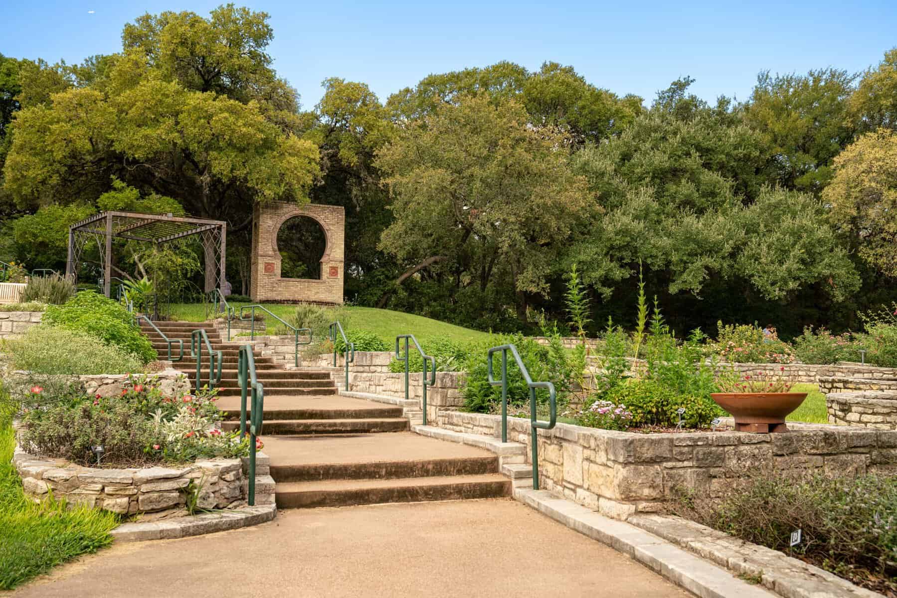 Stone steps and garden arbor at Zilker Botanical Garden in Austin, Texas