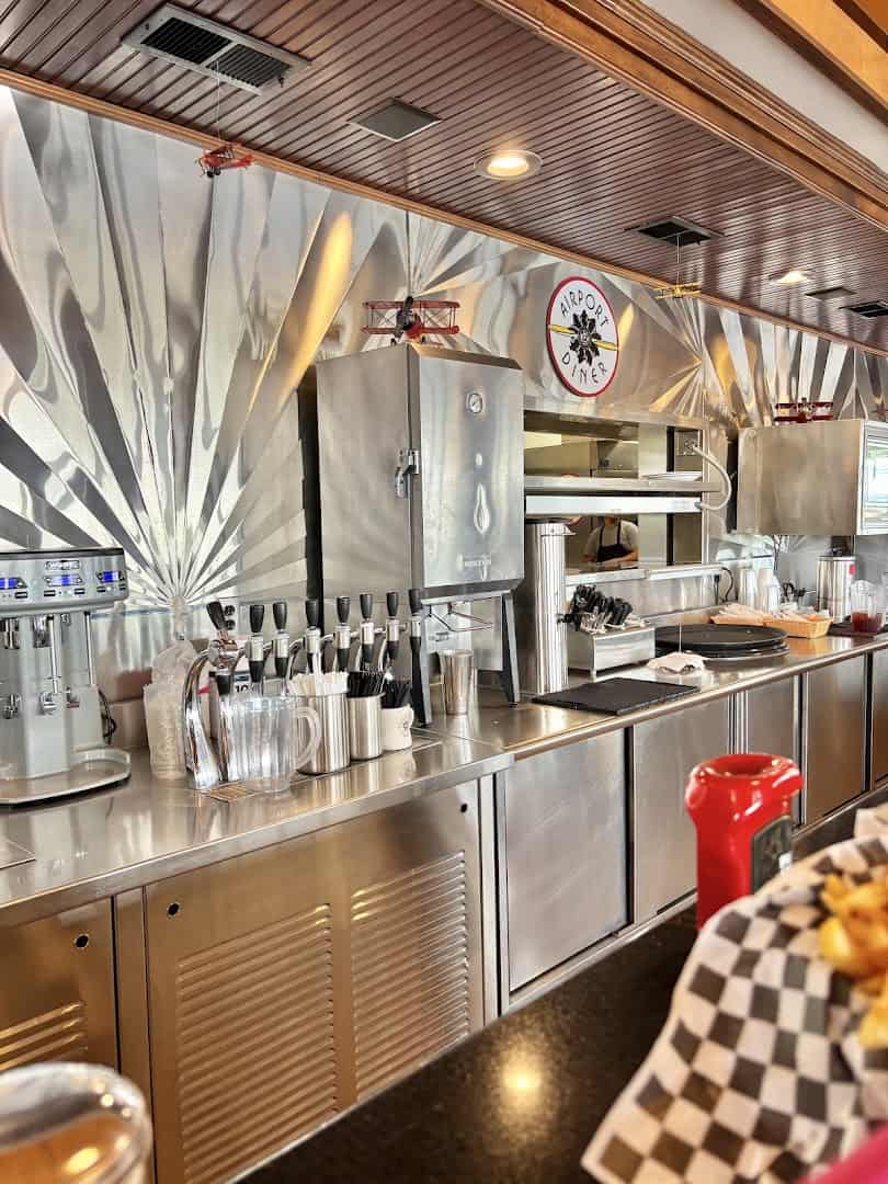 The stainless counter and stools inside the Airport Diner in Fredericksburg, Texas