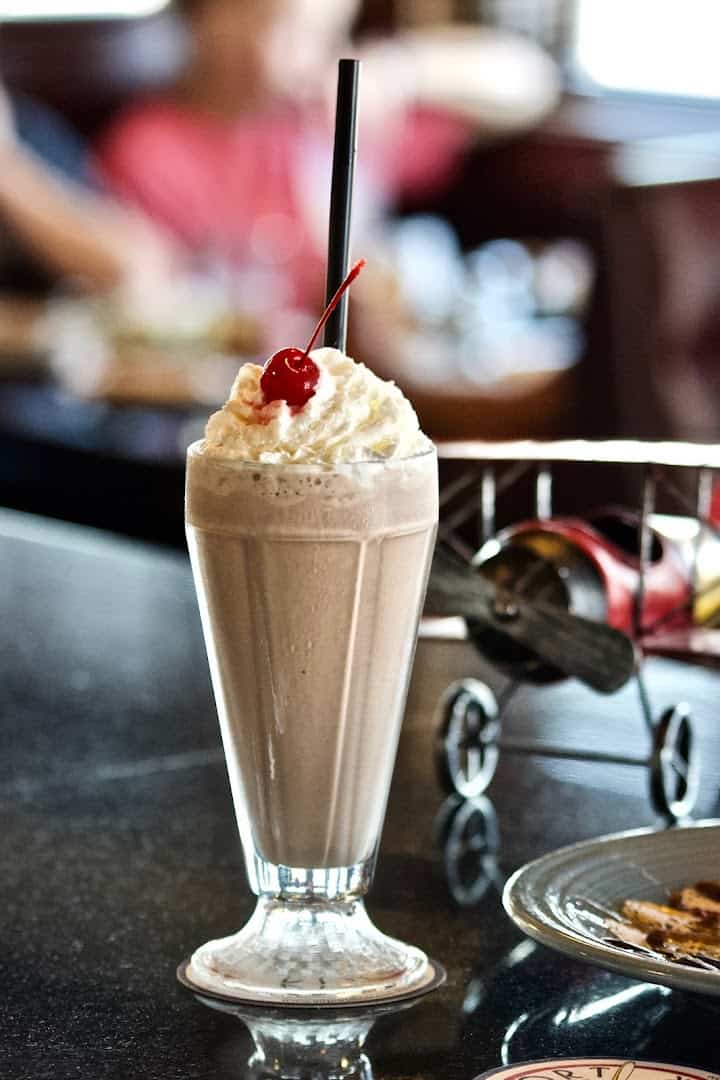 A hand-spun milkshake with whipped cream and a cherry at the Airport Diner in Fredericksburg, Texas