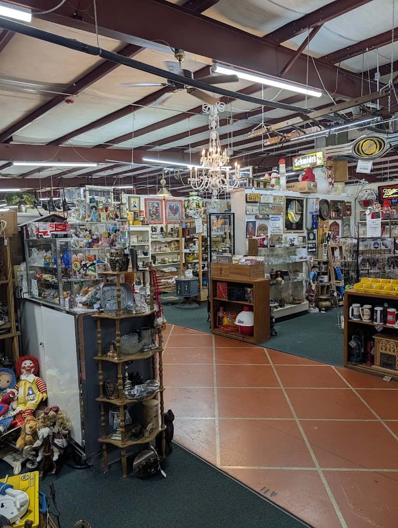 Aisles of vendor booths under the high ceiling at The Antique Gallery of Houston in Spring Texas