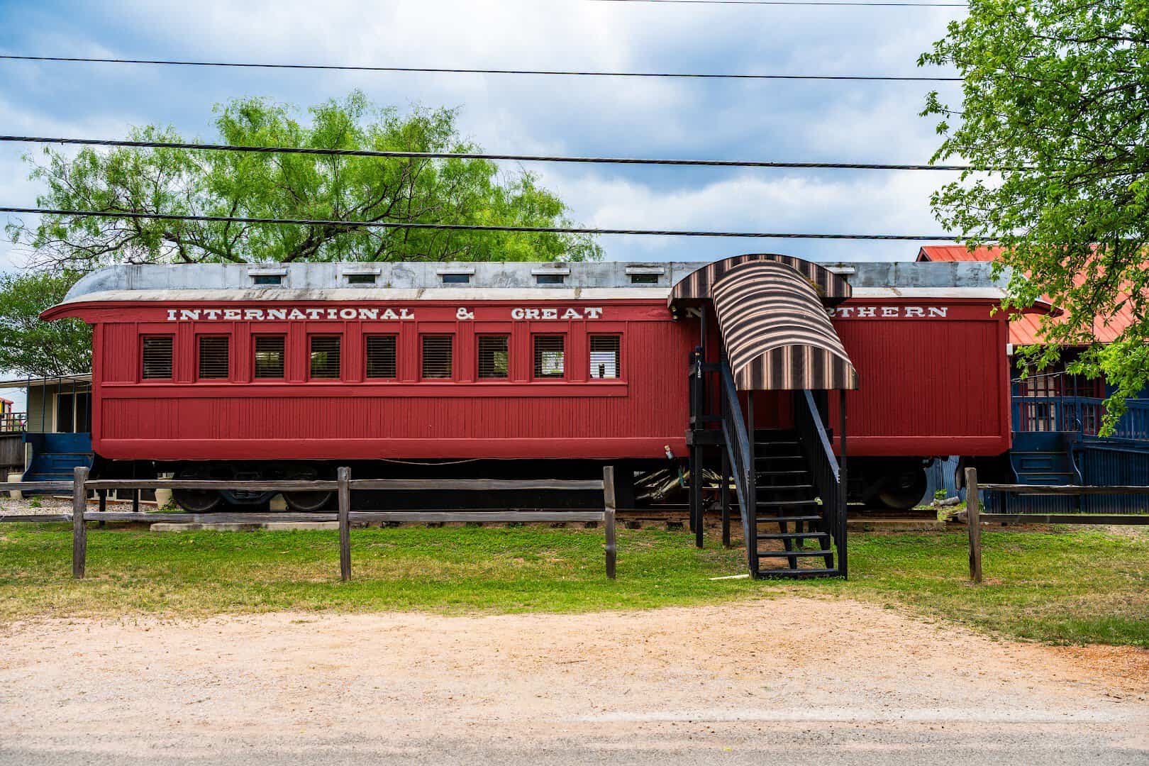 The antique McKinley Coach railcar guest room at The Antlers Inn in Kingsland