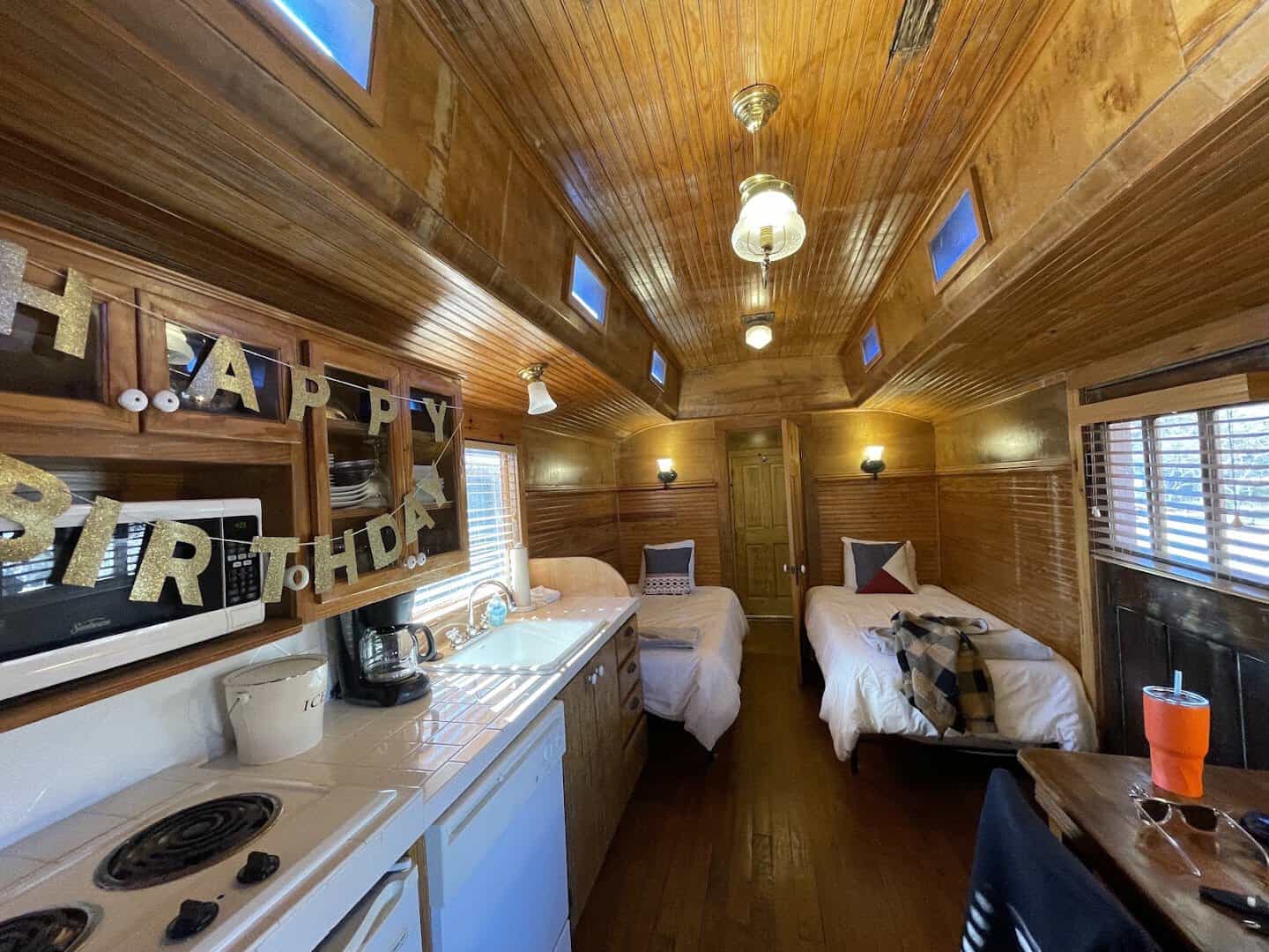 Original wood interior of the McKinley Coach at The Antlers Inn